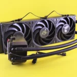 Triple fan liquid cooling system for efficient PC cooling on bright yellow background.