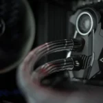 Detailed view of a liquid cooling system inside a desktop computer.