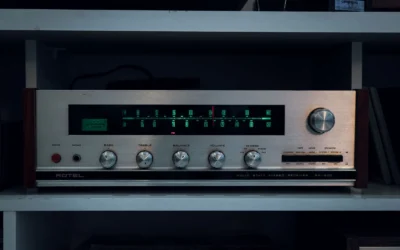 Retro Rotel stereo receiver RX-400 with classic controls and vintage appeal.